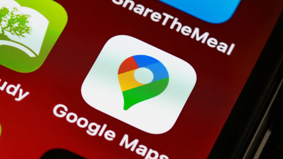 Close-up of the Google Maps app icon on a smartphone for Google Business Profile optimization