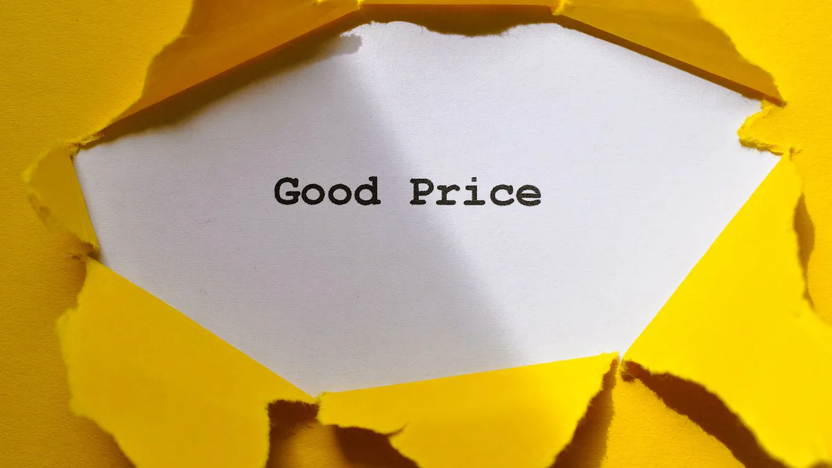 Torn yellow paper revealing the words Good Price, about Google Ads cost