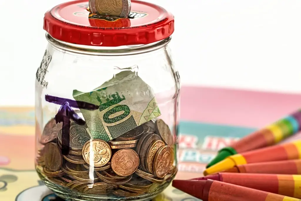 Calculator and notebook showing SEO budget planning for a small business