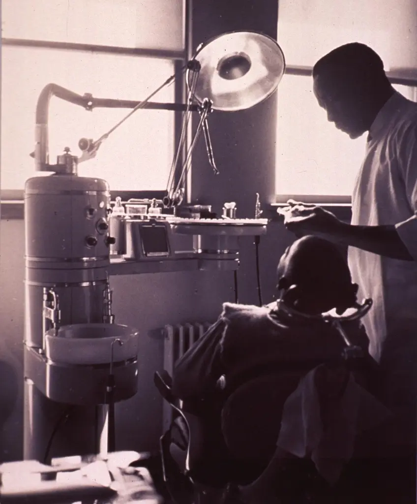 Dentist consulting with a patient in a modern dental practice