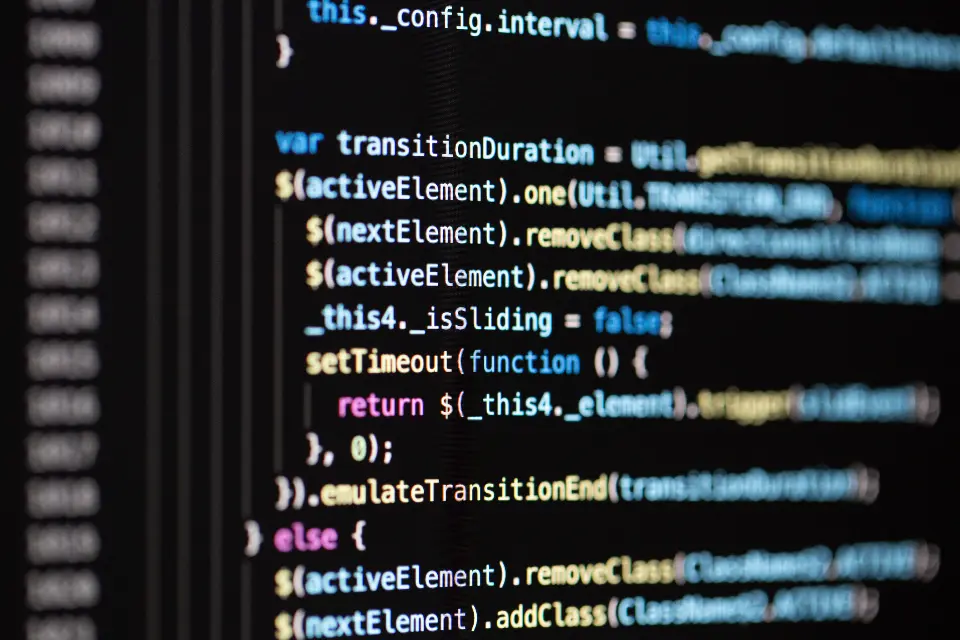 Developer reviewing a technical SEO audit with site speed metrics on screen